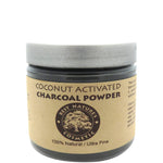 A jar of Coconut Activated Charcoal Powder with a label indicating it is a cosmetic product and providing the brand's name and the product's use for teeth whitening.