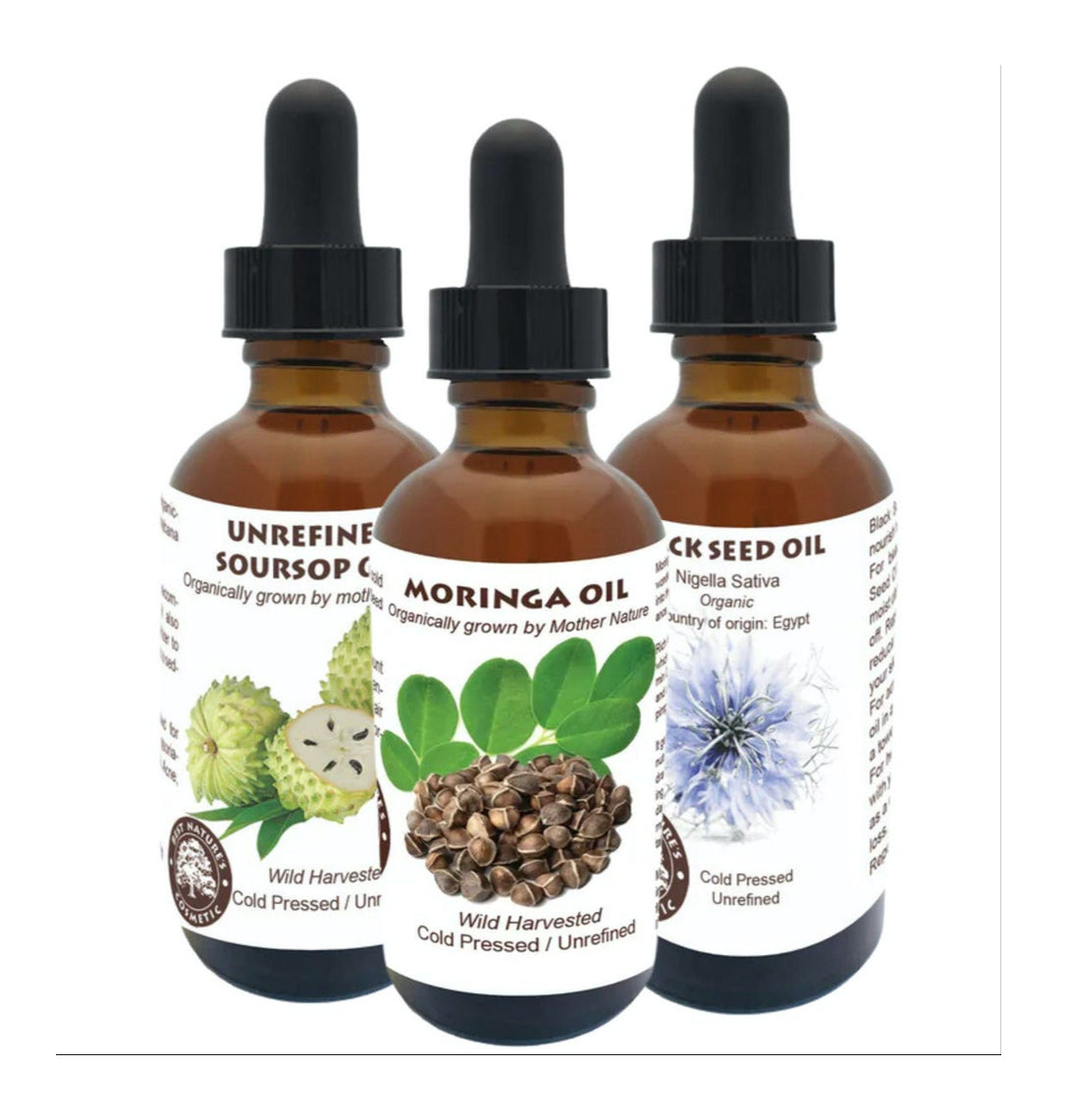 Three dropper bottles labeled with the names of the oils they contain: Soursop, Moringa, and Black Seed Oil, indicating a set of natural oils for skin and hair care.